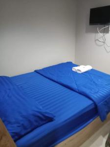 Postel nebo postele na pokoji v ubytování Ban Por Fai + 8 fotografií