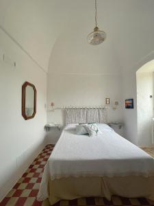 Postel nebo postele na pokoji v ubytování B&B Nonno Ciccio