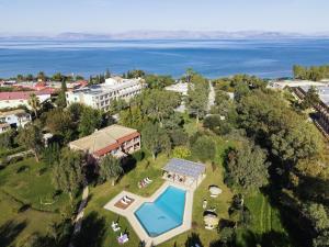 an aerial view of a resort with a swimming pool at Tellis Holiday Rooms in Moraitika