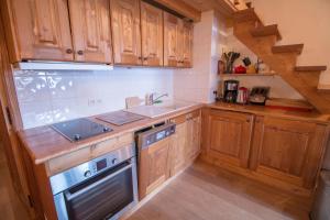 Kuchyň nebo kuchyňský kout v ubytování Chalet De Méribel 6