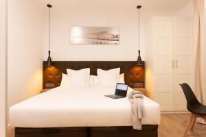 Posteľ alebo postele v izbe v ubytovaní Woohoo Rooms Fuencarral