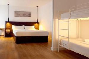 Posteľ alebo postele v izbe v ubytovaní Woohoo Rooms Fuencarral
