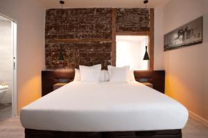 Posteľ alebo postele v izbe v ubytovaní Woohoo Rooms Fuencarral
