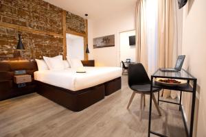Posteľ alebo postele v izbe v ubytovaní Woohoo Rooms Fuencarral