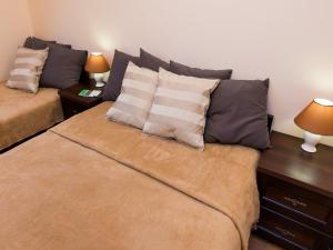 מיטה או מיטות בחדר ב-Vanilla Apartment 1