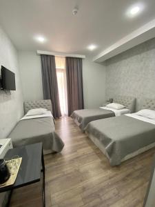 Voodi või voodid majutusasutuse Hotel Rustaveli toas