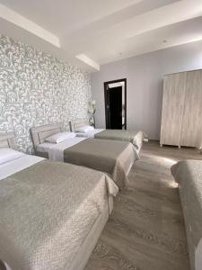 Voodi või voodid majutusasutuse Hotel Rustaveli toas