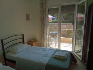 A bed or beds in a room at Irina Haus