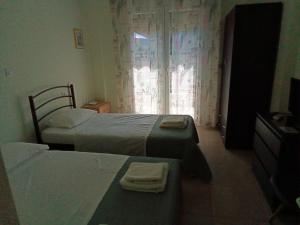 A bed or beds in a room at Irina Haus