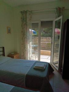 A bed or beds in a room at Irina Haus