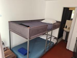 a couple of bunk beds in a room at Casa Vale in Lisbon