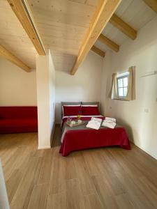 A bed or beds in a room at STAZZU LU CHISSONI