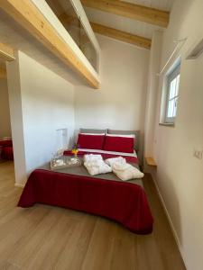 A bed or beds in a room at STAZZU LU CHISSONI