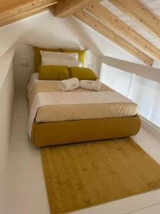 A bed or beds in a room at STAZZU LU CHISSONI