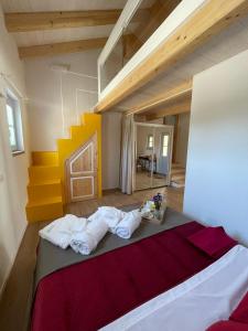 A bed or beds in a room at STAZZU LU CHISSONI