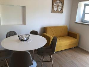 A seating area at STAZZU LU CHISSONI