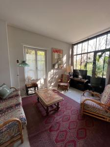 Posedenie v ubytovaní La Maison du Gardien