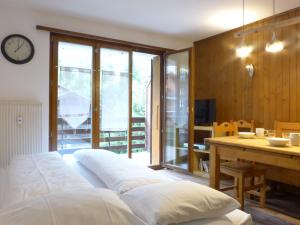 Voodi või voodid majutusasutuse Apartment Galaxie 218 by Interhome toas