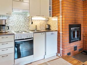 A kitchen or kitchenette at Holiday Home Konkelo 5 by Interhome