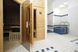 Una cama o camas en una habitación de Hotel Svatý Tomáš
