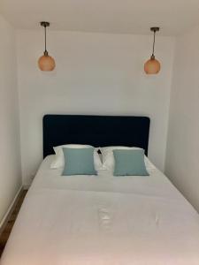 Postel nebo postele na pokoji v ubytování Petit cocoon Aixois