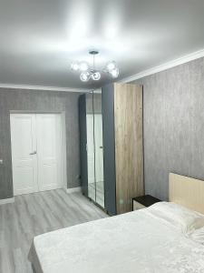 Cama o camas de una habitación en Квартира на берегу Черного моря