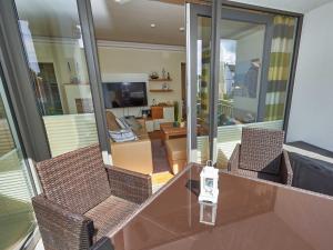 TV a/nebo společenská místnost v ubytování DünenResort Binz - Apt. 3.8 + 17 fotografií