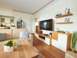 TV a/nebo společenská místnost v ubytování DünenResort Binz - Apt. 3.8
