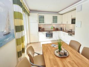 Kuchyň nebo kuchyňský kout v ubytování DünenResort Binz - Apt. 3.8