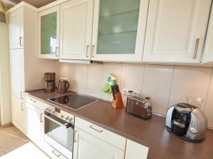 Kuchyň nebo kuchyňský kout v ubytování DünenResort Binz - Apt. 3.8