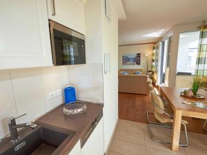 Kuchyň nebo kuchyňský kout v ubytování DünenResort Binz - Apt. 3.8
