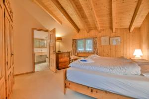 Postel nebo postele na pokoji v ubytování Chalet Arnica