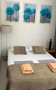 Łóżko lub łóżka w pokoju w obiekcie Apartments Villa Bubi