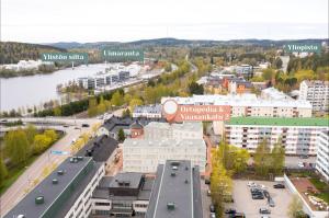 an aerial view of a city with buildings and a street at Forenom Serviced Apartments Jyväskylä Vaasankatu in Jyväskylä