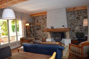 Posezení v ubytování Hameau d'hôtes La Roseraie-Drôme