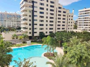 Bazén v ubytování Parque Mariola 300m beach Paradise Pool Paddle nebo v jeho okolí