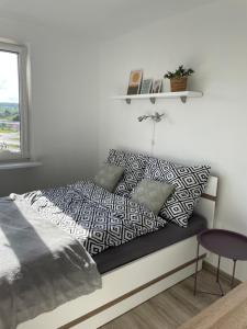 Posteľ alebo postele v izbe v ubytovaní Apartament Wałbrzych