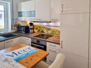 Kuchyň nebo kuchyňský kout v ubytování Ferienwohnung Sonnenblick