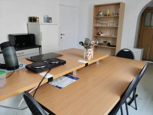 TV a/nebo společenská místnost v ubytování Ostend BackPackers Lodge + 11 fotografií