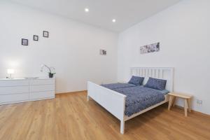 Posteľ alebo postele v izbe v ubytovaní Pat & Mat Apartment