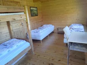 Postel nebo postele na pokoji v ubytování Rauðsdalur