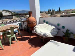 Fotografia z galérie ubytovania Cosy House, Sunny Terrace, Amazing Views & Outdoor Bathtub! v destinácii Granada