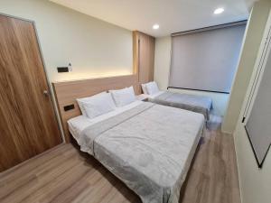 Postel nebo postele na pokoji v ubytování Lovely 1878 Apartment 3-bedrooms with free parking