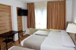 Voodi või voodid majutusasutuse Hotel Terranova toas