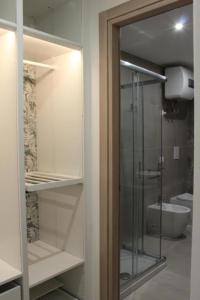 A bathroom at Luxury Apartment with balcony garden view