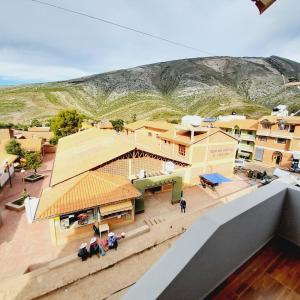 an overhead view of a village with buildings at HOSTAL EDEN in Torotoro