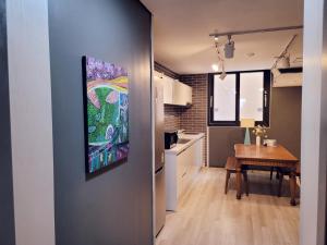 Kuchyň nebo kuchyňský kout v ubytování Picasso Guesthouse