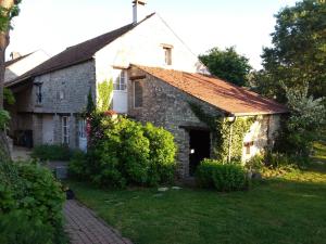 Vonkajšia záhrada v ubytovaní Gîte - à l'Ombre du Teil