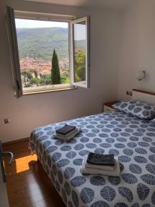 Postel nebo postele na pokoji v ubytování BellaVista Jelsa 2+2