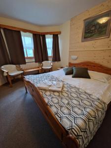 Voodi või voodid majutusasutuse Guesthouse Jelenov greben toas